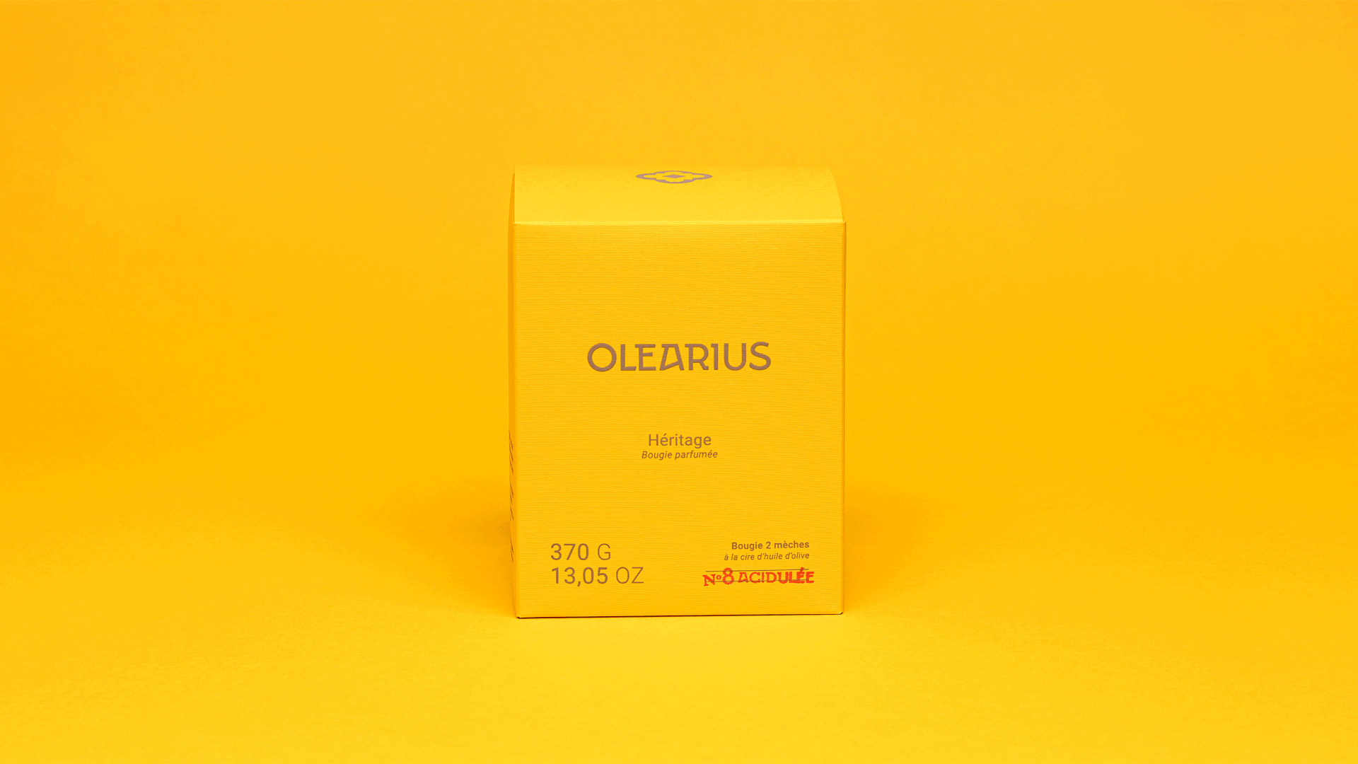 Packshot animation of the Olearius Heritage No. 8 "Acidulée" candle set on a yellow background — vrai studio