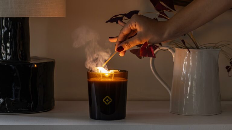 Lighting a Heritage candle indoors — lifestyle photography by Olearius · vrai studio